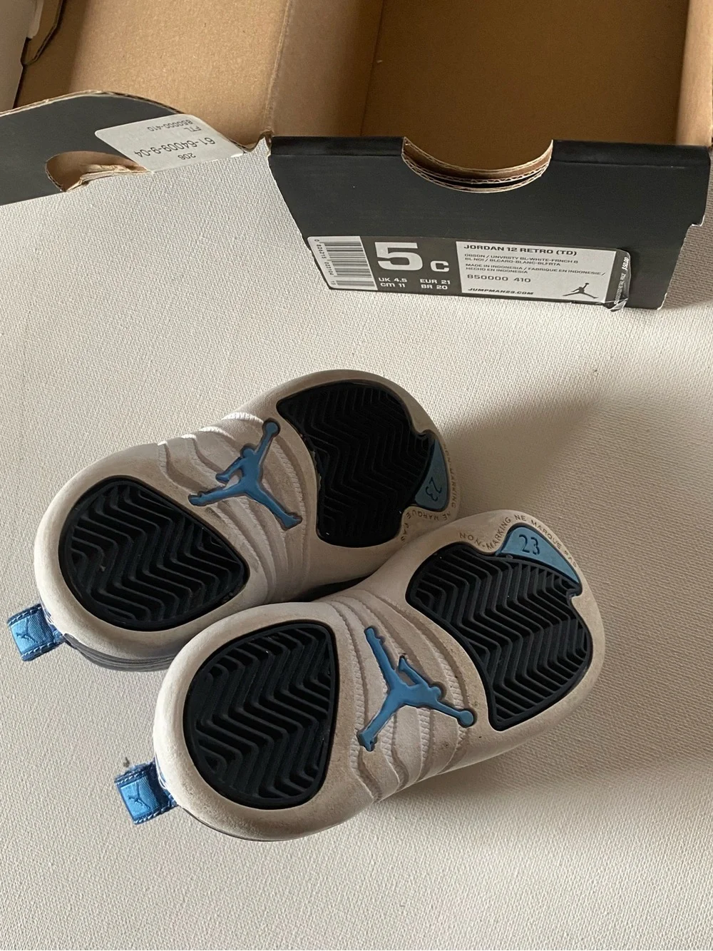 Nike Kids Navy and White Jordan 12’s